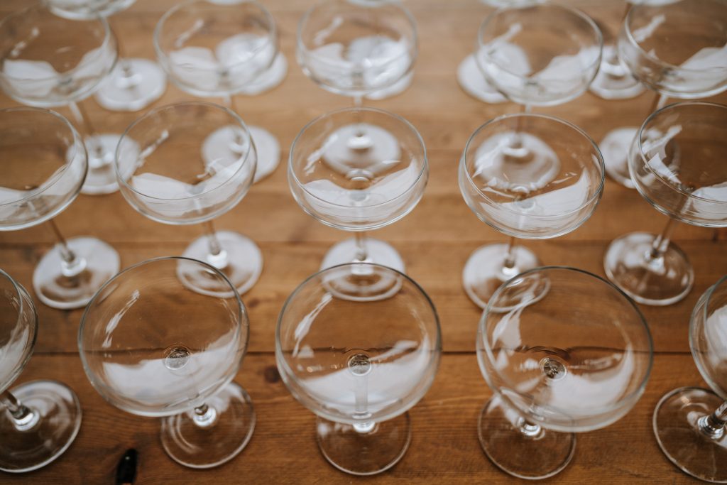 Outdoor drinks reception with champagne flutes